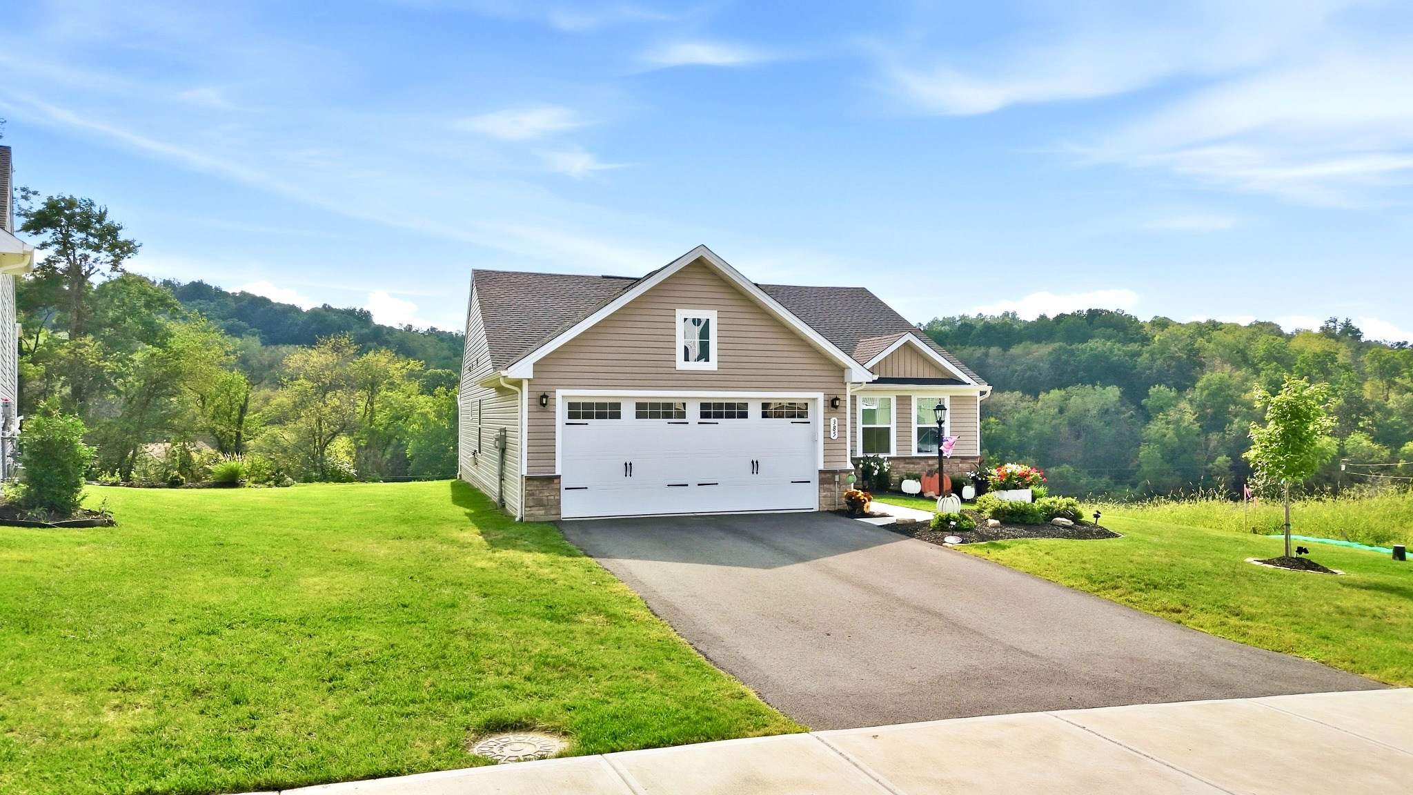 Front exterior and side lawn
