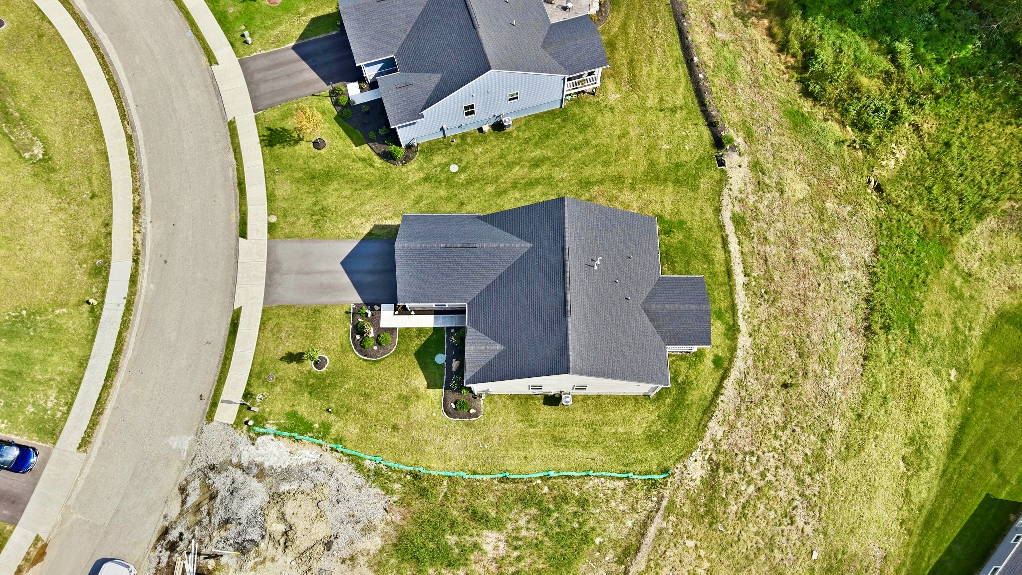 Top-down aerial of the home and lot